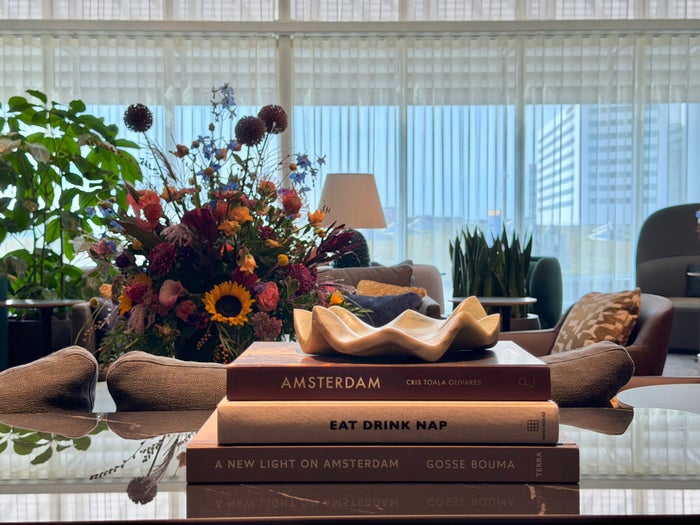 Amsterdam Amex Centurion Lounge books and flowers
