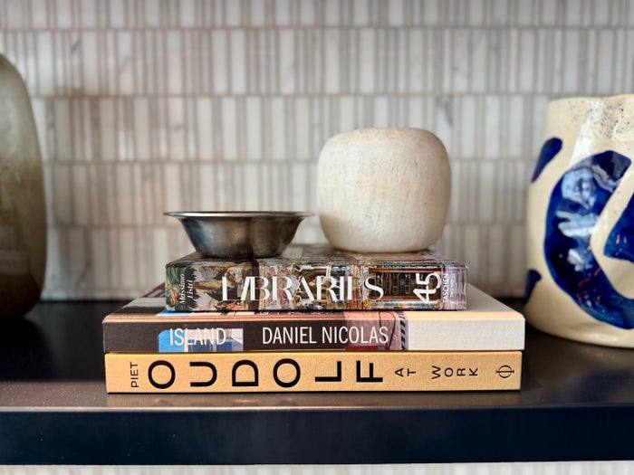 Amsterdam Amex Centurion Lounge books and vases
