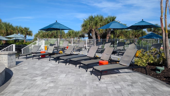 Hilton Garden Inn Cocoa Beach Oceanfront amenities pool loungers