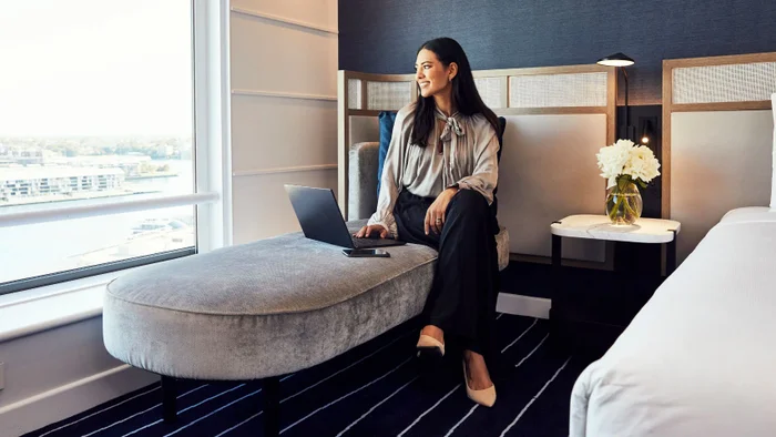 Hyatt Centric Downtown St Louis woman in room Hyatt Centric Downtown St Louis woman in room